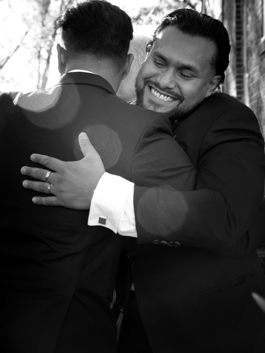 A couple's embrace — black and white editorial photograph