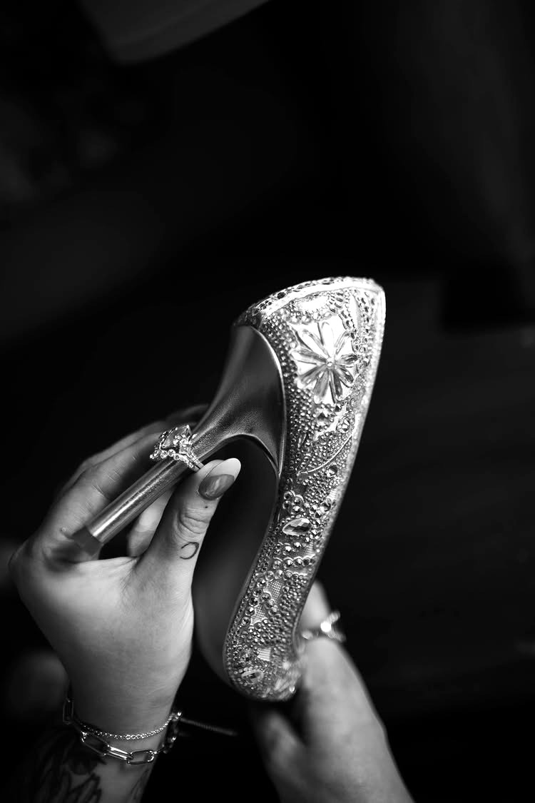 Lanecia Smith — the signature crystal shoe, black and white